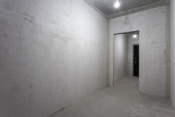 interior of the apartment without decoration in gray colors. rough finish