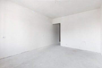 interior of the apartment without decoration in gray colors. rough finish