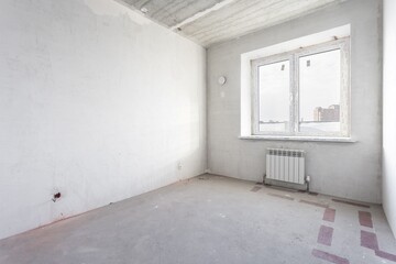 interior of the apartment without decoration in gray colors. rough finish