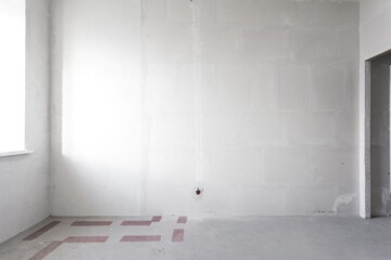 interior of the apartment without decoration in gray colors. rough finish