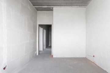 interior of the apartment without decoration in gray colors. rough finish