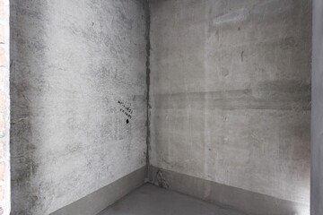 interior of the apartment without decoration in gray colors. rough finish
