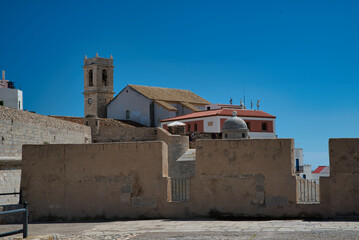 Fototapeta premium Walls and corners of the medieval castle of Peñiscola. On the orange blossom coast of the Mediterranean Sea. Castellón, Spain. 