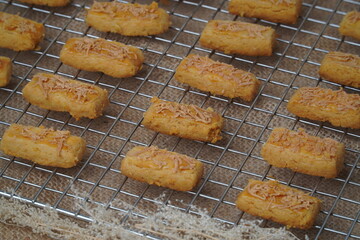 Fresh from the oven crunchy kaastengels cookies Indonesian cookies typically served during Hari Raya Idul Fitri
