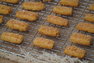 Fresh from the oven crunchy kaastengels cookies Indonesian cookies typically served during Hari Raya Idul Fitri
