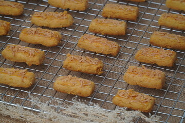 Fresh from the oven crunchy kaastengels cookies Indonesian cookies typically served during Hari Raya Idul Fitri
