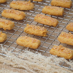 Fresh from the oven crunchy kaastengels cookies Indonesian cookies typically served during Hari Raya Idul Fitri

