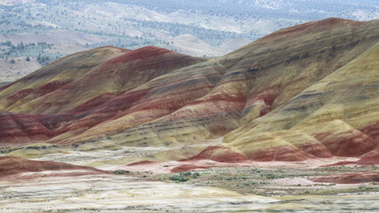 John Day Fossil Beds Painted Hills Unit colorful hillside in spring with bands of color across the hill