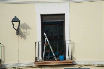 Façade with balcony prepared for cleaning