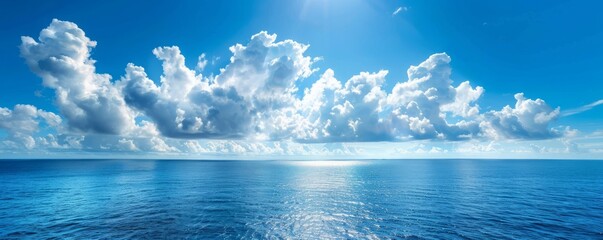 Scenic view of sea against blue sky during summer - Powered by Adobe