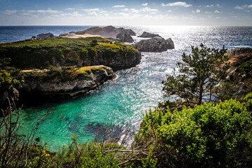 Turquoise ocean leads out to the Pacific in Point Lobos National Reserve in Carmel, California.