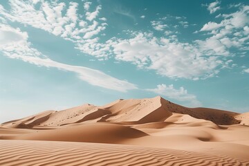 Soaring Sand Dunes A Dramatic Desert Landscape Basking in the Brilliance of a Clear Blue Sky