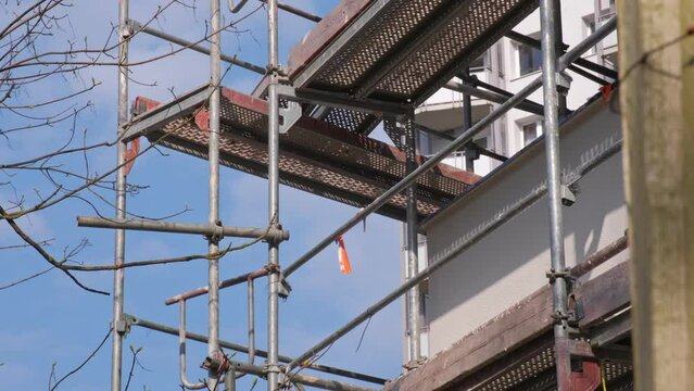 Construction Site Scaffolding Outside of Apartment Residential Building