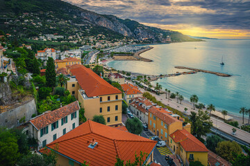 Stunning waterfront buildings view at sunrise, Menton, France