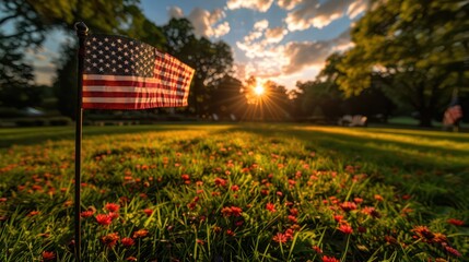 An evocative image of the American flag on a blooming flower field bathed in the warm light of a setting sun - Powered by Adobe