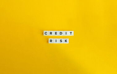Credit Risk Term. Text on Block Letter Tiles on Yellow Background. Minimal Aesthetic.