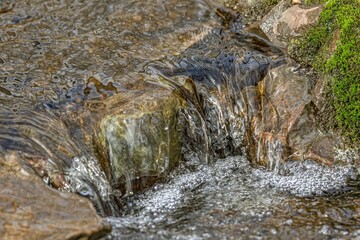 water flowing over rocks