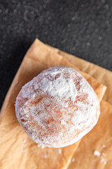  filled donut chocolate filling powdered sugar fresh meal food snack on the table copy space food background rustic