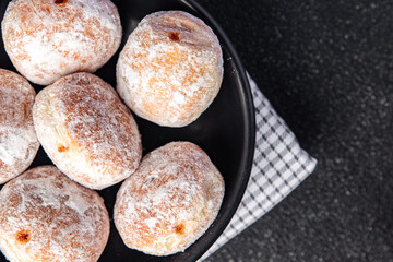 filled donut chocolate filling powdered sugar fresh meal food snack on the table copy space food...