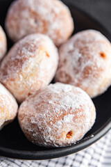  filled donut chocolate filling powdered sugar fresh meal food snack on the table copy space food background rustic
