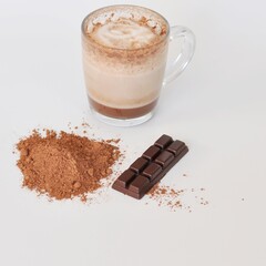 Handmade chocolate with glass of hot chocolate