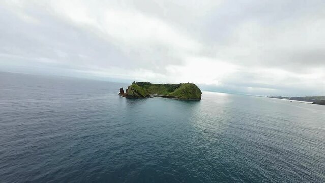 Drone shot of a scenic island Vila Franca do Campo at the coast of Sao Miguel island, Azores. 