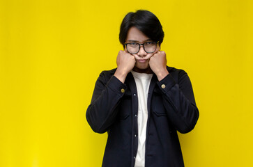 man feeling uncertain and unsure. Thoughtful asian man thinking and wondering with hand touching...