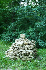 A stack of rocks in a garden