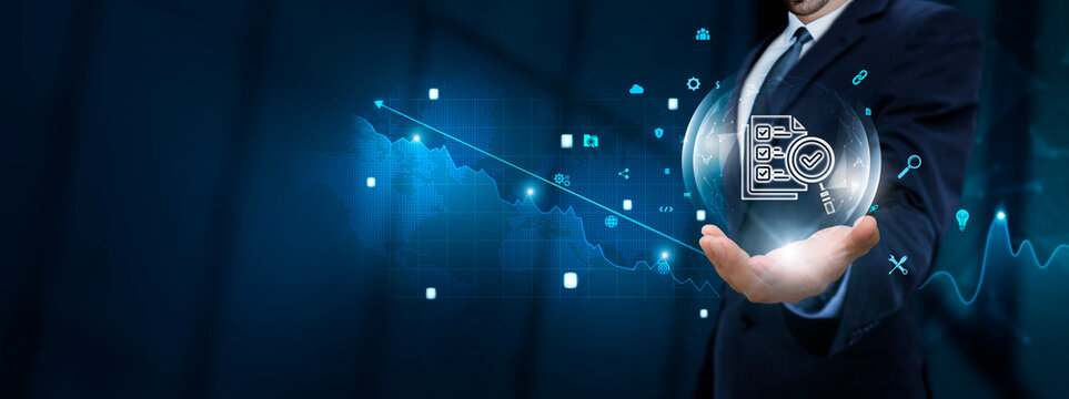 Assessment: Businessman Hand Holding Assessment Icon with Technological Icons. Analysis and Evaluation, Data-driven Decision Making, Continuous Improvement.