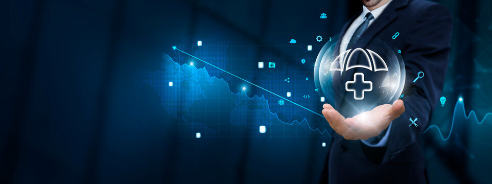 Insurance: Businessman hand holding Insurance icon with Technological Icons. Risk Management and Policy Coverage on Blue City Background.