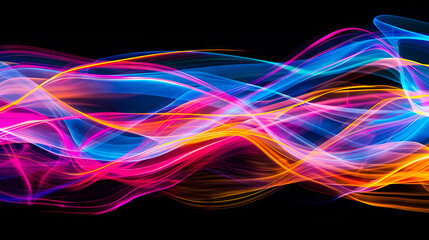 Fototapeta premium Abstract colorful light waves on black background.