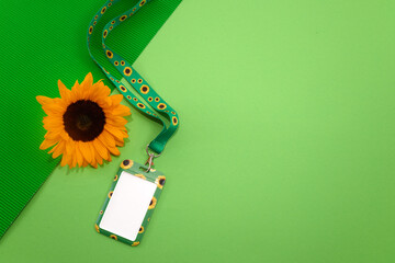 Sunflower lanyard, symbol of people with invisible or hidden disabilities.