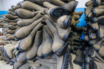 Finished products in the warehouse of a factory for the production of felt boots.