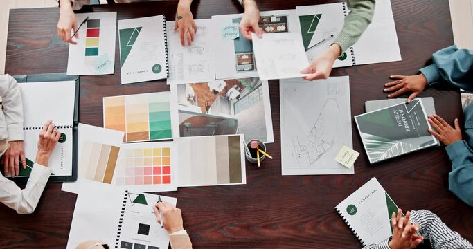 Meeting, planning and above of business people for design, pattern and color for advertising agency. Creative company, teamwork and workers with documents for charts, collaboration and branding