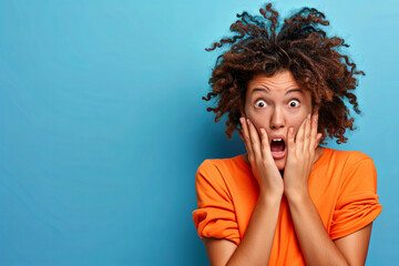 Oops. Closeup photo of sad terrified lady horrified facial expression made big mistake feel guilty look side empty space bite lips fingers wear orange shirt isolated blue color background
