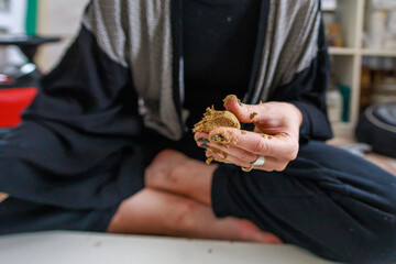 Manual process of making incense cones.