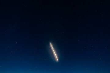 Shooting star in the sky. A meteorite burns up in the atmosphere