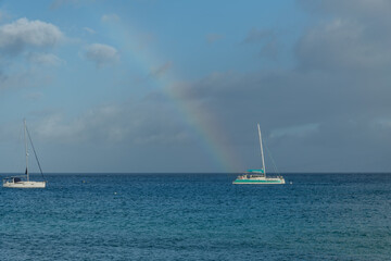 Fototapeta premium Beautiful Kaanapali Beach vista in early morning with a rainbow in the background, Maui, Hawaii