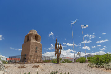 Santa Barbara tower with the flags of Argentina and Jujuy. - obrazy, fototapety, plakaty