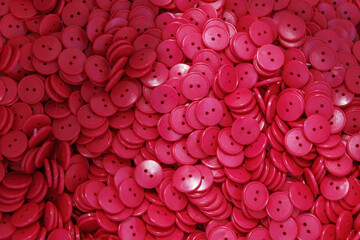 Close-up view of a red buttons. - obrazy, fototapety, plakaty