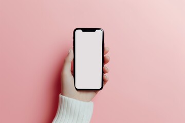 A hand holding a phone with an empty white screen