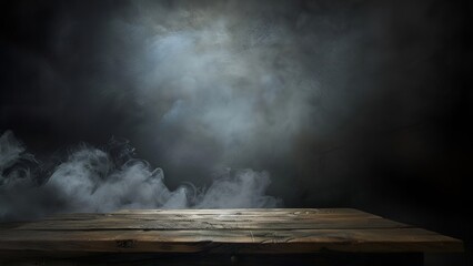 Dark and mysterious wooden table with a smoky background