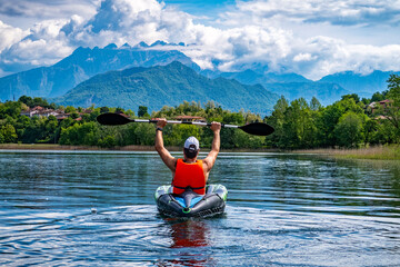 Canoeing scene on Lake Pusiano - obrazy, fototapety, plakaty