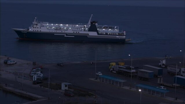 Ship arriving at the port of Rafina, Greece, and passengers disembarking