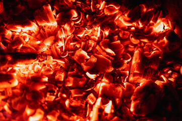 hot red coal top view close up, background, low key