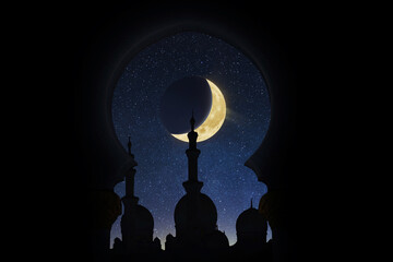 Mosque at night with a month. Silhouette on the background of the starry sky. Ramadan.