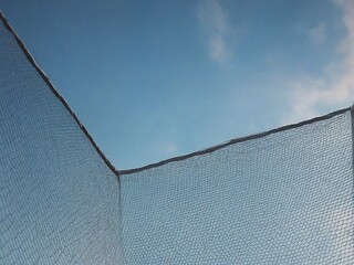wire fence against sky