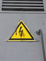 High voltage sign on the side of a military aircraft. Close-up.