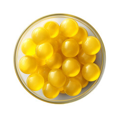 yellow pills in a glass bowl