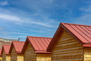 Many shacks with red roofs